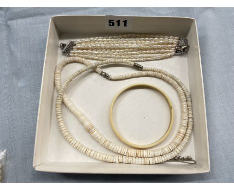 TEN STRAND PEARL BRACELET, TWO BEAD BRACELETS AND A BANGLE 