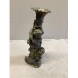 A lead putti garden ornament, height 78cm