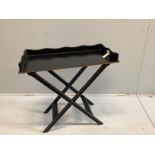 An Indian painted butler's tray on folding stand, width 84cm, depth 43cm, height 81cm