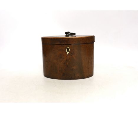 A George III oval mahogany tea caddy with bone lock escutcheon, 12cm high