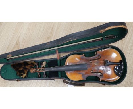 A cased 19th century Continental violin with lions head carved scroll, length of body, 35.5cm, with bow CITES Submission refe