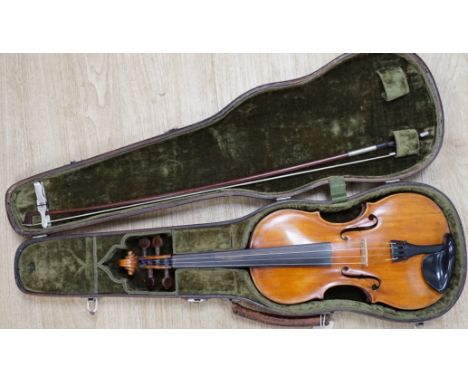 An early 19th century cased Italian violin labelled Florentus Florenus, body length 35cm, with a French silver mounted bow st