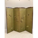 An early 20th century Chinese embroidered four fold dressing screen decorated with swallows, each