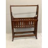 An Arts and Crafts oak rocking crib, width 97cm, height 130cm