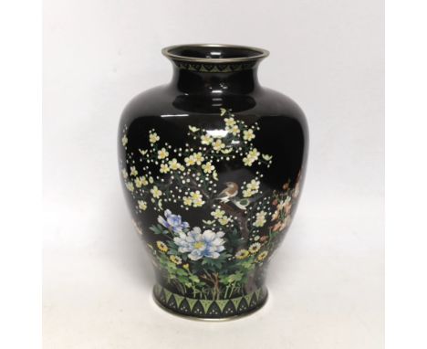 A Japanese silver wire cloisonné enamel vase, early 20th century, enamelled with birds and flowers, 25cm high Circular bruise