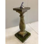 A reconstituted stone garden sundial with lead gnomon, width 30cm, height 106cm