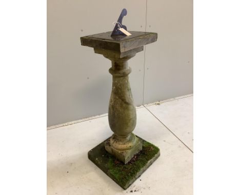 A reconstituted stone garden sundial with lead gnomon, width 30cm, height 106cm