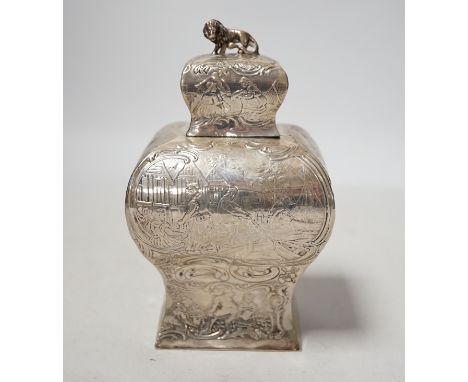 A late 19th century Hanau embossed white metal bombe shaped tea caddy, with lion en passant finial, 13.8cm, 5.5 oz.
