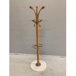 A mid century low coat and stick stand, height 129cm