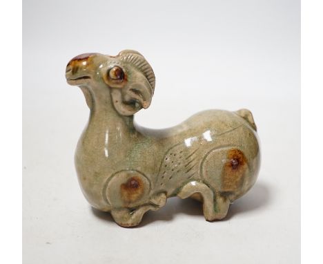 A Chinese Yue type green glazed model of a ram, 10cm wide