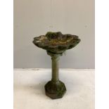 A reconstituted stone scallop shell bird bath, width 56cm, height 90cm