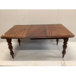 A Victorian mahogany extending dining table, length 162cm extended, one spare leaf, depth 102cm,