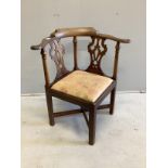 A George III mahogany corner elbow chair, width 73cm, depth 61cm, height 80cm