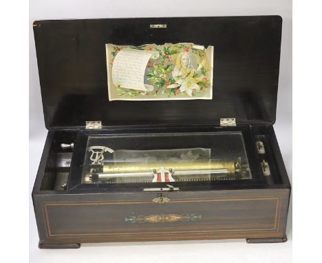 A late 19th century Swiss inlaid rosewood cased musical box, single cylinder with a 52 note comb playing twelve airs, tune in