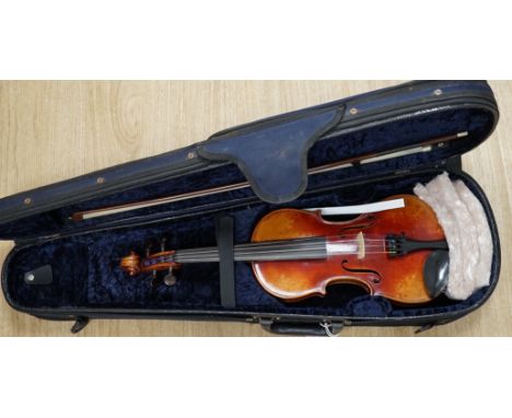 A cased fine French half size violin, Mirecourt, length of body 31.5cm with a bow and case, CITES Submission reference SLU5G6