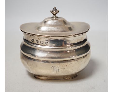 A George V silver oval tea caddy, William Hutton &amp; Sons, Sheffield, 1927, width 93mm, 4.6oz.
