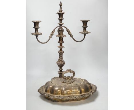 A silver plated entree dish and cover and a pair of three light candelabra, tallest 55cm