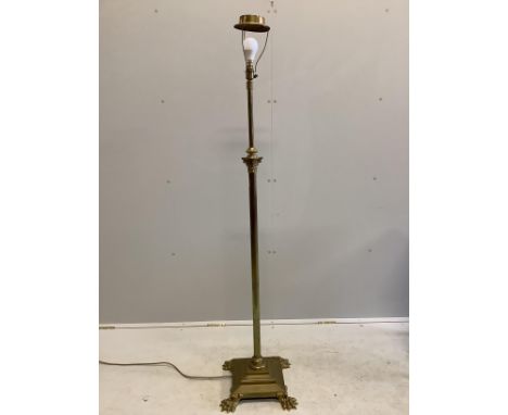 A Corinthian column brass telescopic lamp standard