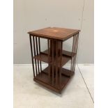 An Edwardian style inlaid mahogany revolving bookcase, width 49cm, depth 49cm, height 81cm