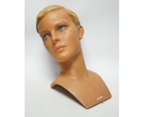An Imans, Paris, plaster mannequin shop display head of a boy, 30cm high