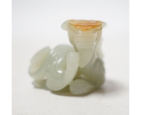 A Chinese pale celadon and russet skin jade figure of a dragon, 4cm high Small graze to russet section; small, shallow chip t