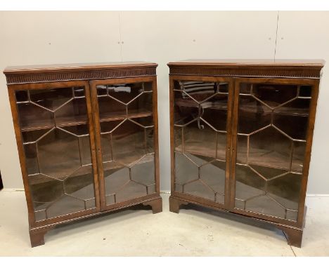A pair of Chippendale Revival mahogany dwarf bookcases, each 97cm, depth 34cm, height 119cm