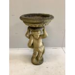 A reconstituted stone cherub bird bath, diameter 53cm, height 97cm
