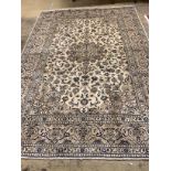 A fine Kashan ivory ground carpet, 291 x 195cm