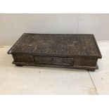 An African rectangular carved hardwood low table, width 122cm, depth 60cm, height 29cm