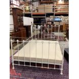 A Victorian style brass mounted painted metal double bed frame, width 150cm, length 208cm, height