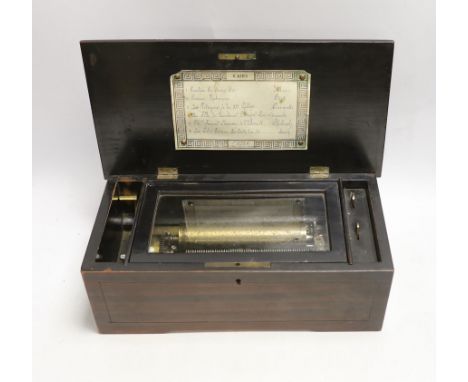 An inlaid rosewood cased musical box, single cylinder with a 56 note comb (one tooth broken and missing) playing six airs, tu