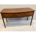 A George III mahogany three drawer bowfront serving table, width 141cm, depth 62cm, height 81cm