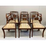 A set of six Regency style brass inlaid mahogany dining chairs, two with arms