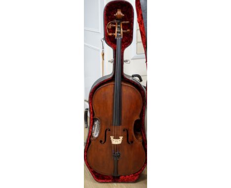 A cased early 20th century ‘cello, length of body 75.5cm, with two spare bridges, and spare strings There is no evidence of a