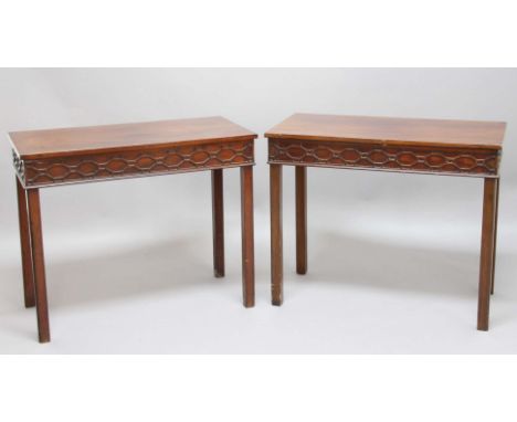 PAIR OF GEORGE III MAHOGANY SIDE TABLES, late 18th century, possibly Irish, the frieze with Chippendale style blind fret work