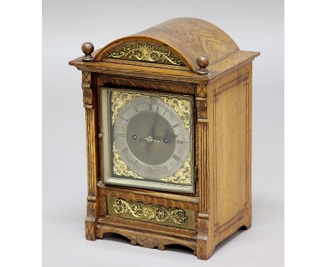 OAK CASED MANTEL CLOCK, the brass dial with 5 1/2" silvered chapter ring, on a brass eight day twin fusee movement quarterly 