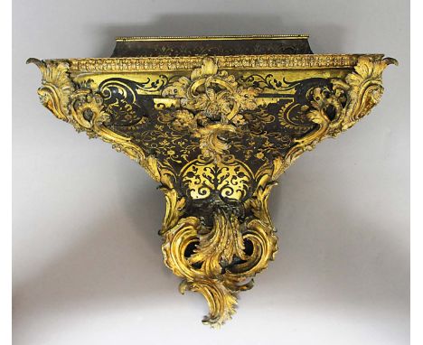 BOULLE WORK CLOCK BRACKET, 19th century, the raised platform, possibly later, on a tapering base, rococo style ormolu scrolli