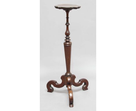 ROSEWOOD AND MAHOGANY TORCHERE, later 19th century, the shaped top on a turned and tapering octagonal column and scrolling tr