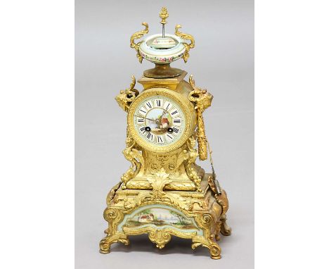 FRENCH GILT METAL AND PORCELAIN MOUNTED MANTEL CLOCK, the 3 1/2" painted dial on a brass eight day movement striking to a bel