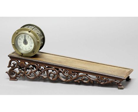 INCLINE PLANE GRAVITY CLOCK, 20th Century, the ivorine dial with arabic numerals in a brass drum case, the hardwood plane wit