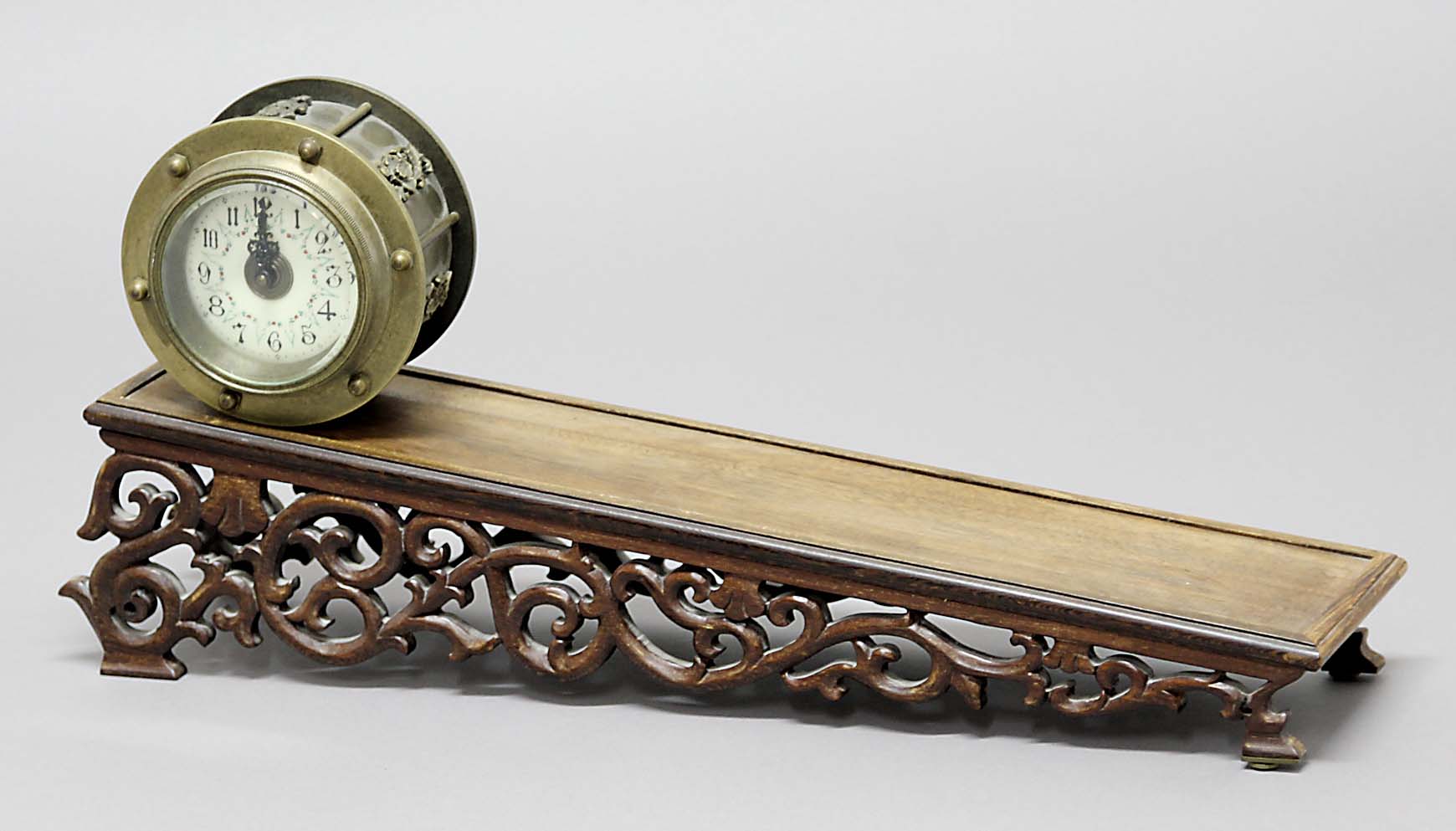 INCLINE PLANE GRAVITY CLOCK, 20th Century, the ivorine dial with arabic