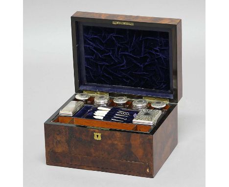 VICTORIAN BURR WALNUT DRESSING BOX, the velvet lined fitted interior with glass and white metal mounted jars and boxes, and m