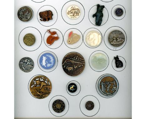 20 S/M/L 19th-20th century assorted materials including cats. This partial card includes a large variety of animal buttons in