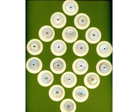 20 Medium 19th century pearls specialized to "Colonial". Here is a card of 20 pearl buttons all what at one point was conside