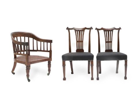 A George IV Mahogany and Bobbin-Turned Horseshoe-Shaped Armchair, 2nd quarter 19th century, the curved top rail above a singl