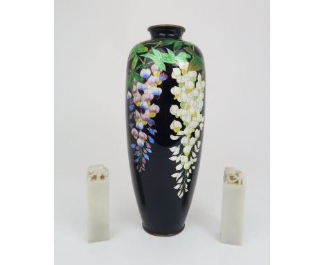 A PAIR OF CHINESE JADE SEALS each carved with a shishi, inscribed  and dated 29.11.1982 and carved matrix MR, 11cm high and a