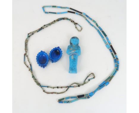 AN EGYPTIAN BLUE GLAZED SHABTI 10cm high, two Egyptian ceramic glazed necklaces, 51cm long and a pair of blue glazed ceramic 