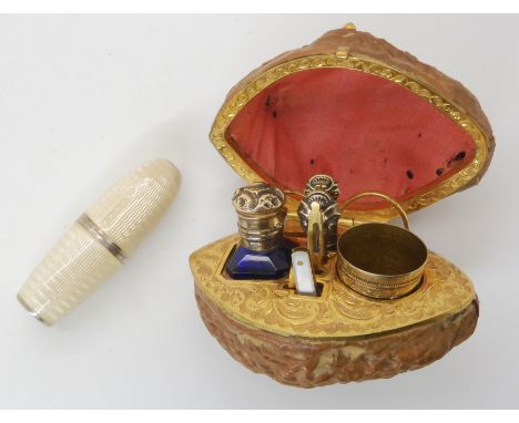 A CHARMING WALNUT SHELL ETUI AND GUILLOCHE ENAMEL SCENT BOTTLE etui; the silver gilt thimble and other items stamped with the