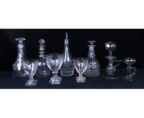 A COLLECTION OF ANTIQUE GLASSWARE including two lace makers lamps, a pair of lemon squeezer pattern goblets, a larger example