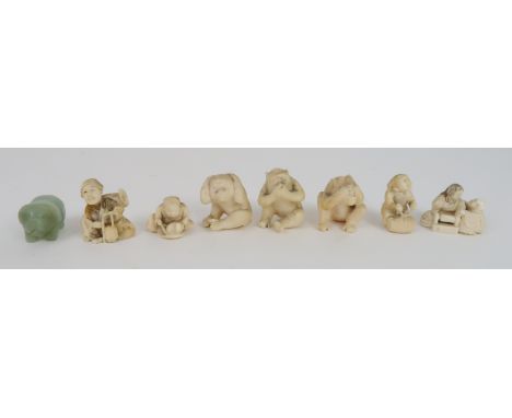 FOUR IVORY NETSUKE each a seated figure, 3 to 4cm high, three ivory wise monkeys, 4cm high and a jadeite carving of a piglet,